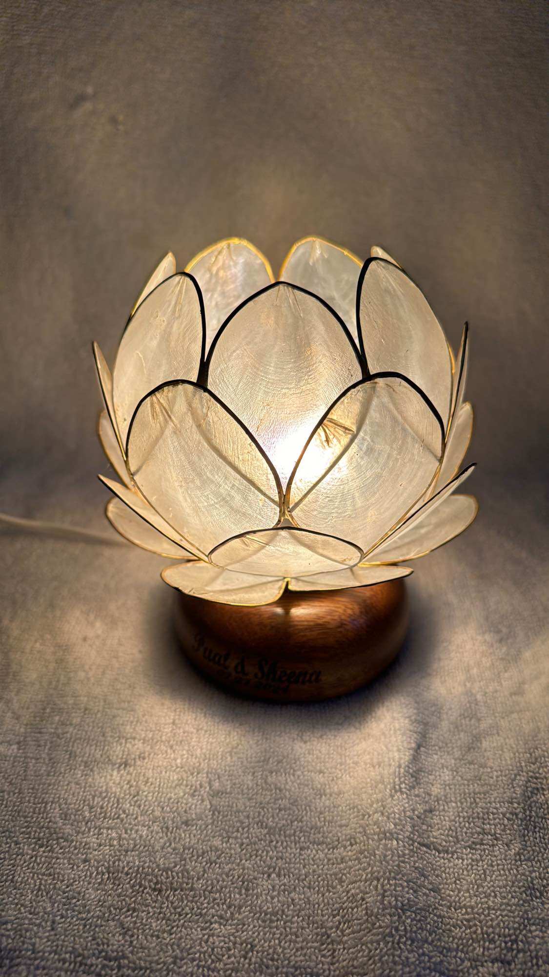 Product photo of Capiz shell lotus table lamp (bulb included) from its Lazada listing