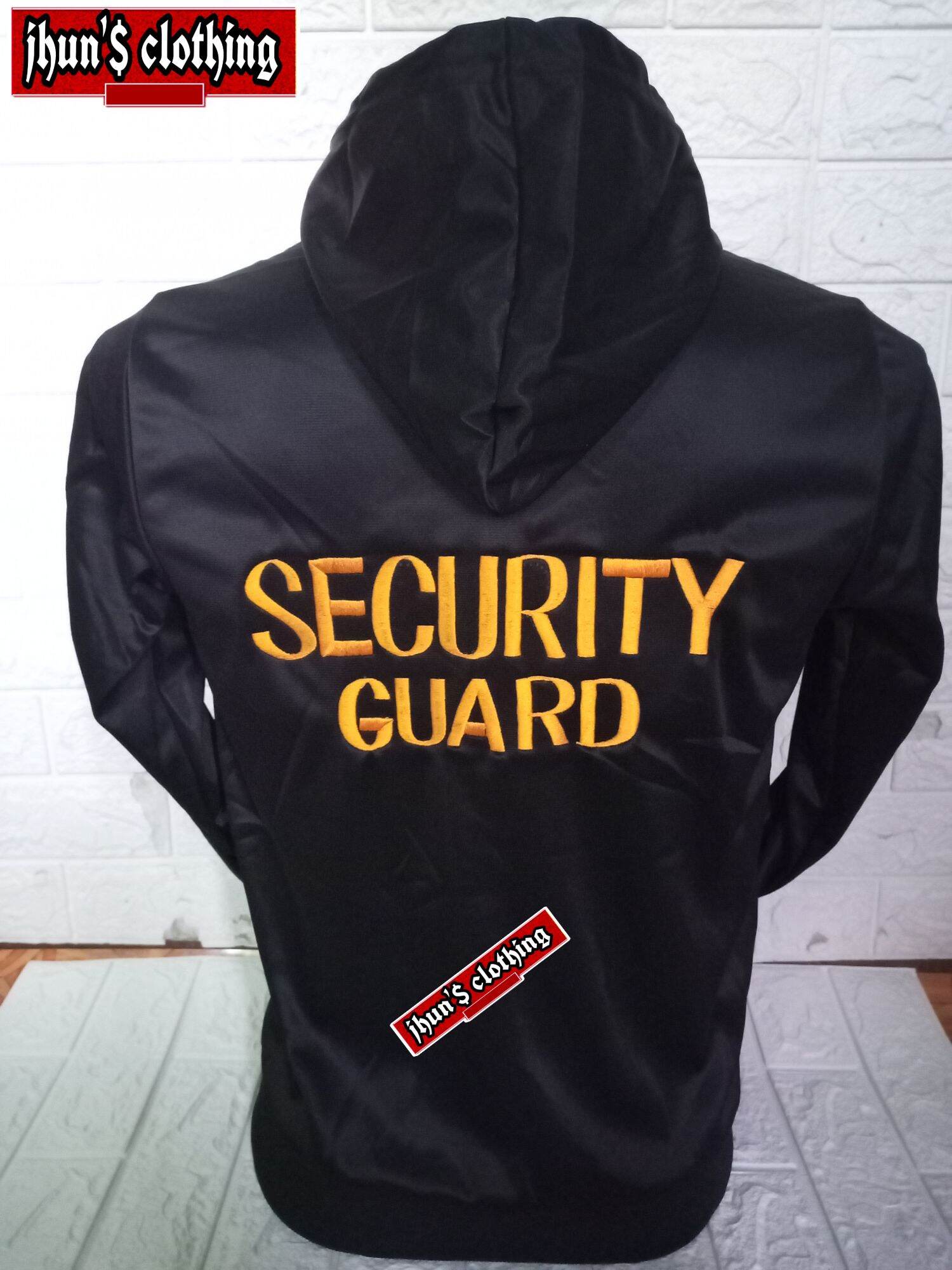 Security Guard Wearing Jacket Stock Photo by ©AndreyPopov 80378696