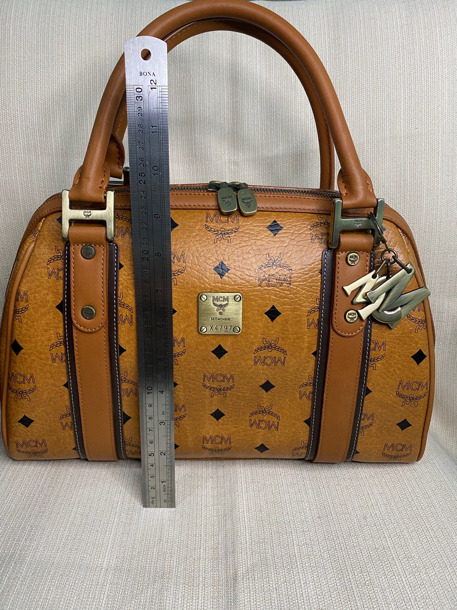 MCM Cognac alma Handbag, Luxury, Bags & Wallets on Carousell
