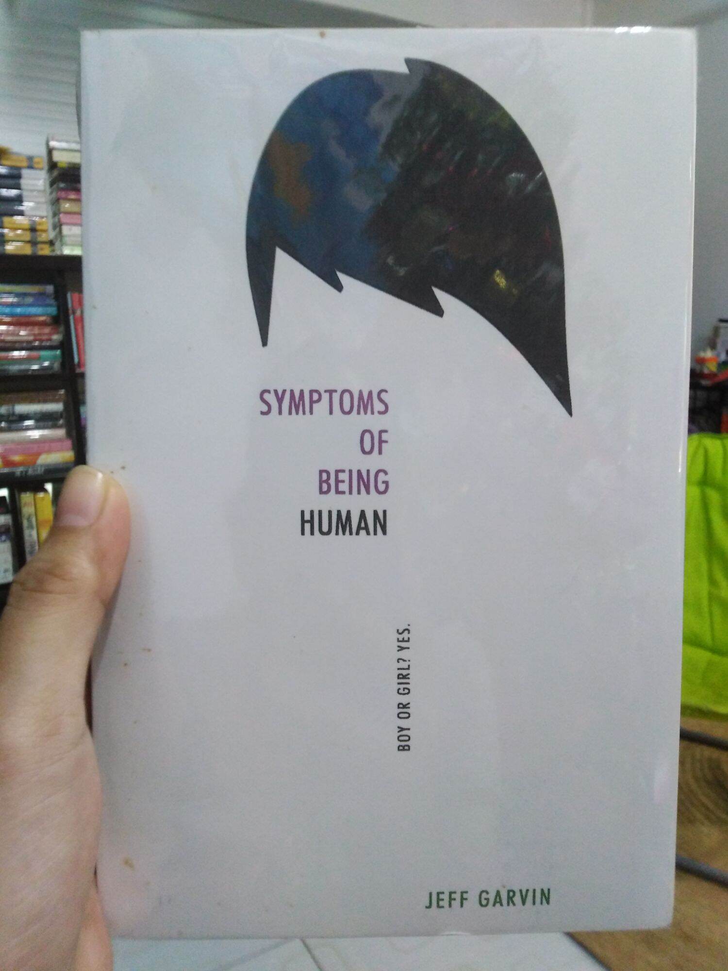 Symptoms of Being Human by Jeff Garvin preloved | Lazada PH