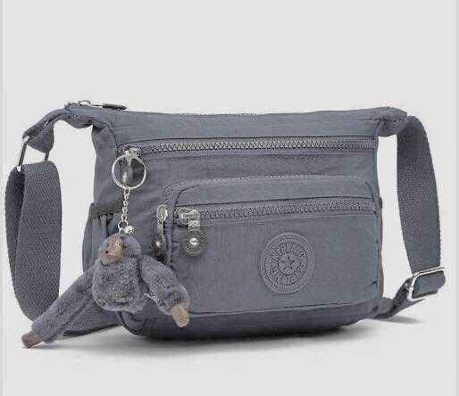 FLS Women's Multi-Compartment Sling Bag with Monkey Keychain