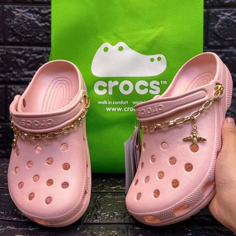 pink crocs with chain