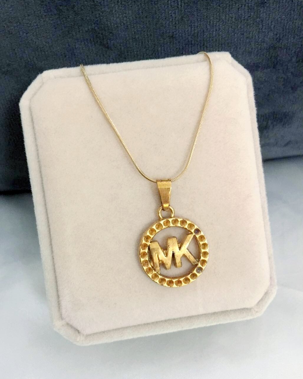 mk gold pendant