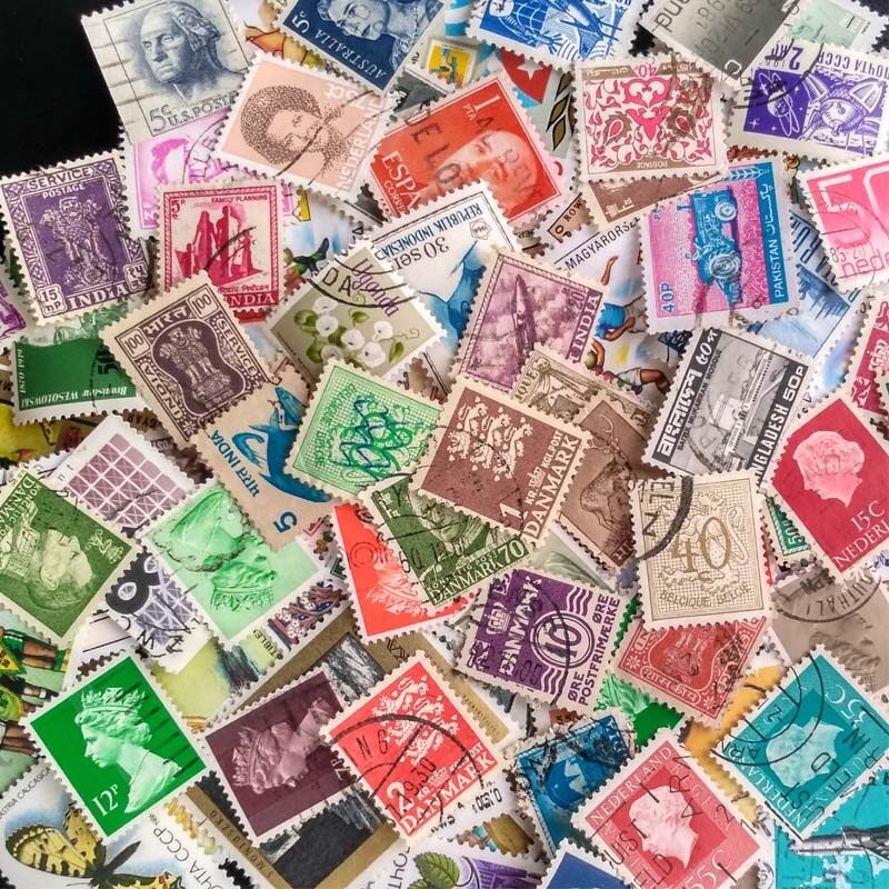 100 PCS All Different World Postage Stamps With Post Mark.
