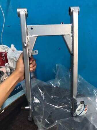 STM SWING ARM WAVE 100/125. 