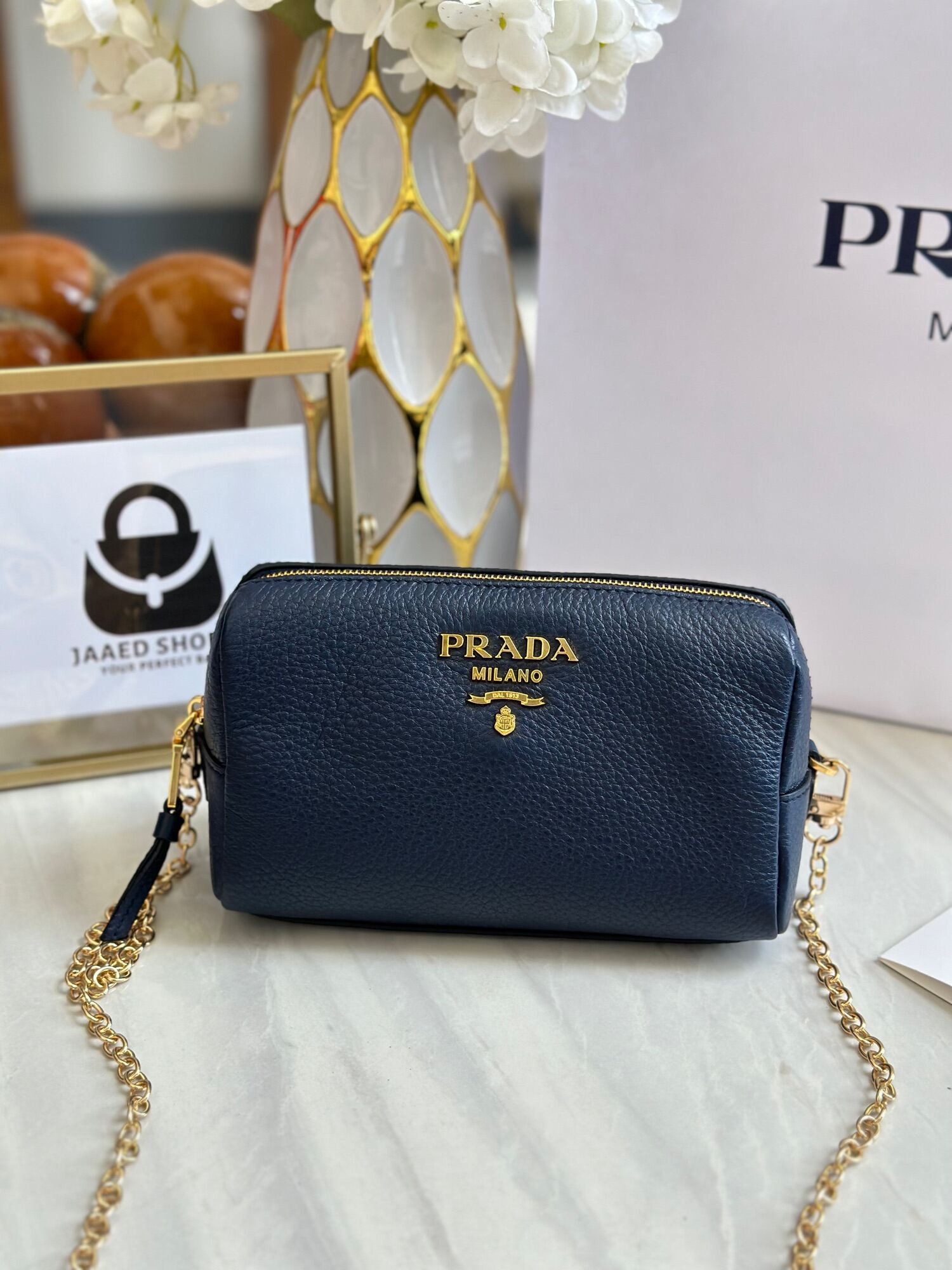 Prada Pouch convertible to crossbody comes with generic chain