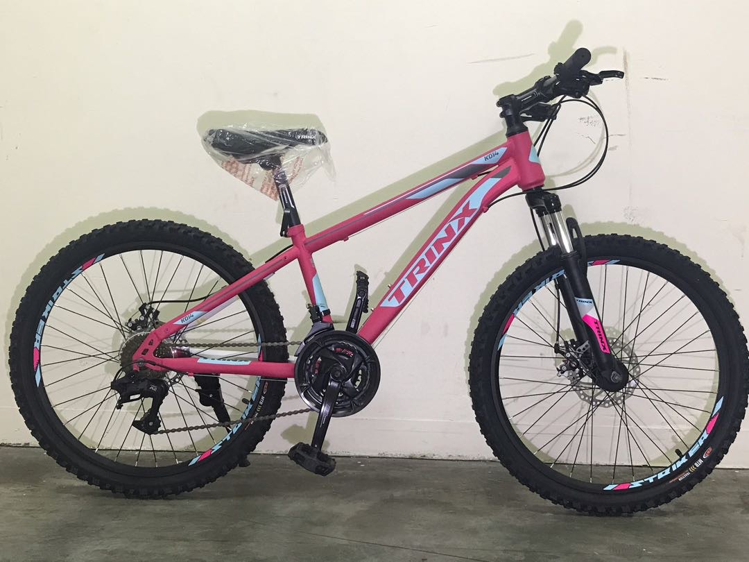 trinx mountain bike pink