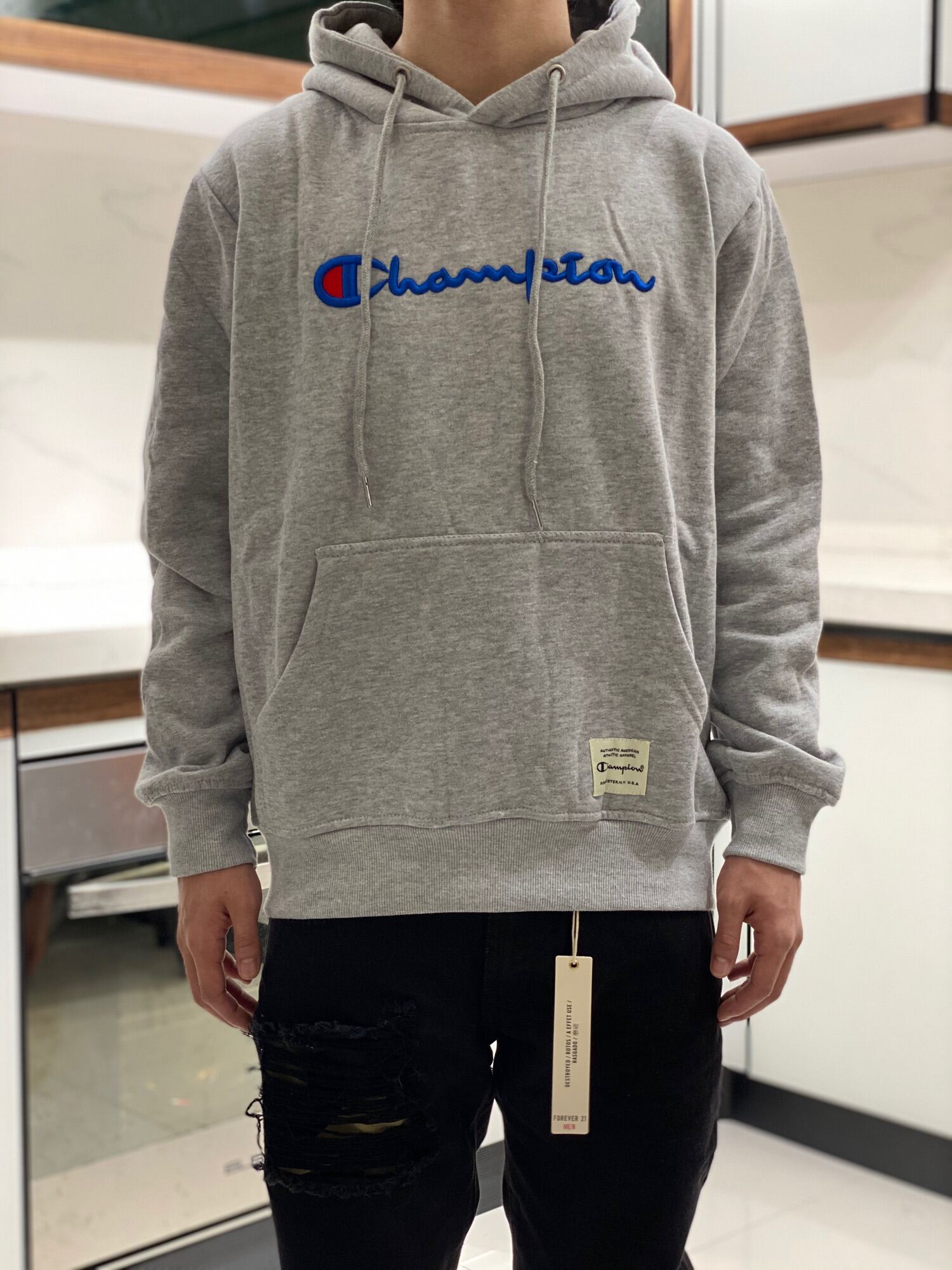 Champion hoodie tag sale