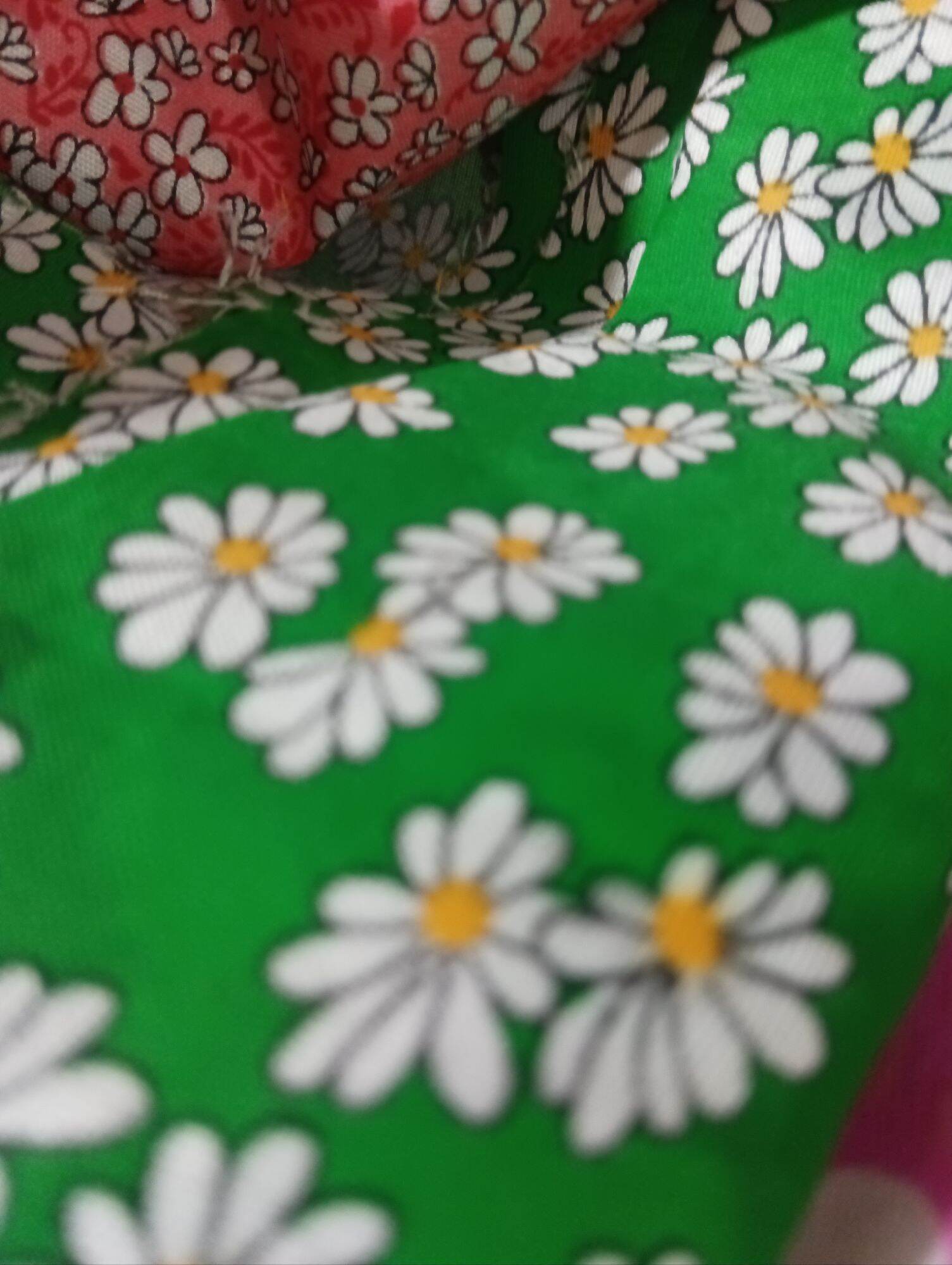 C. cotton printed sold per yard 36.Inches by 36 inches.