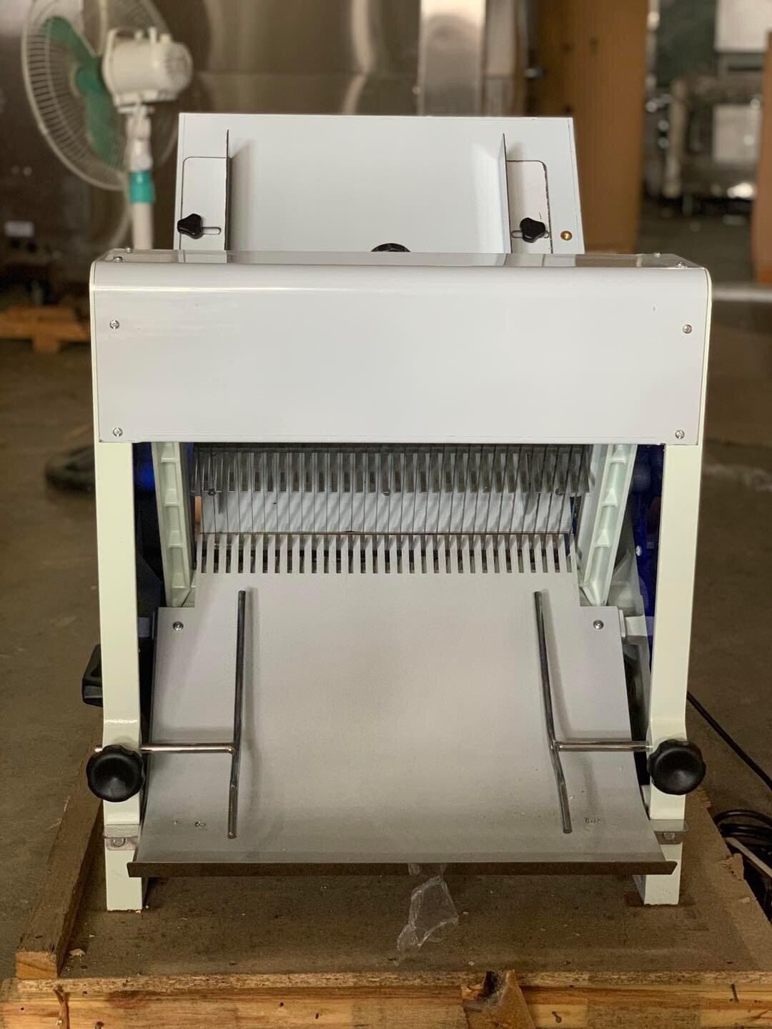 New bread slicer at my local shop. : r/EngineeringPorn