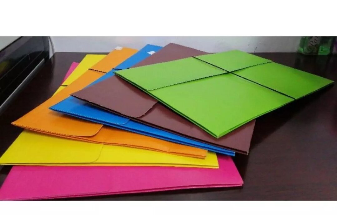 12 pcs assorted expanded envelope long envelope with garter. 