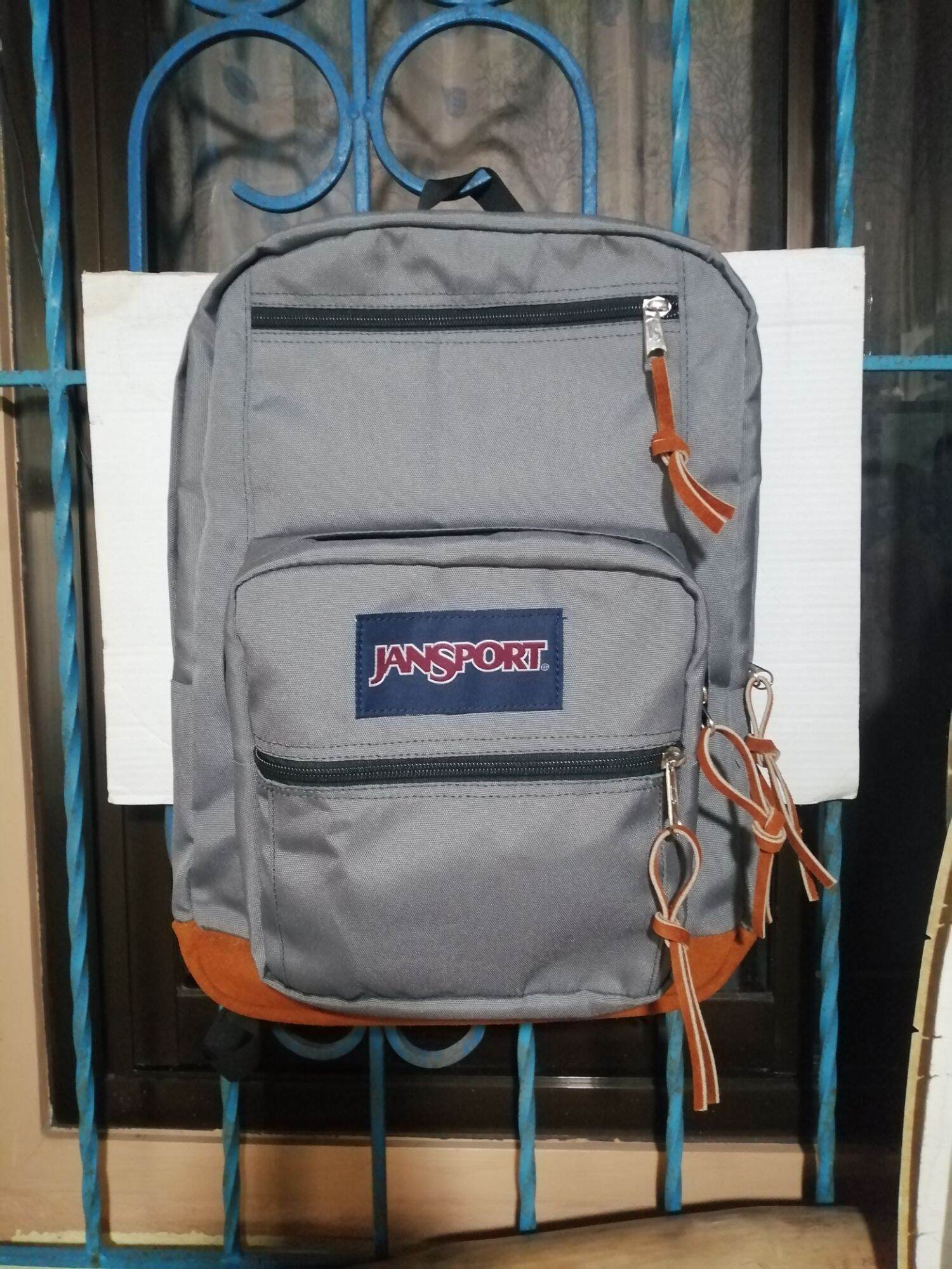 Jansport big student 2025 backpack leather bottom