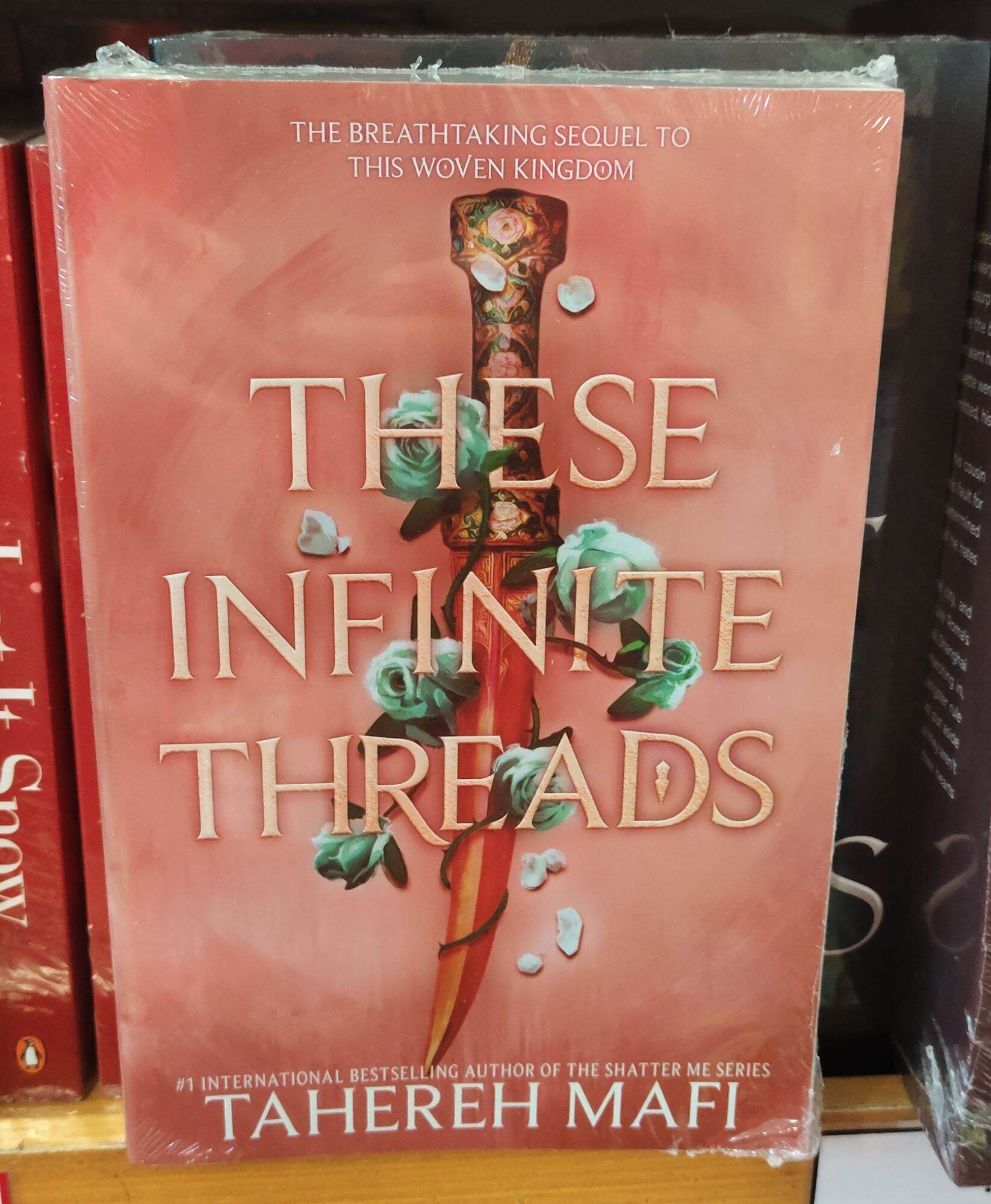 This Woven Kingdom | These Infinite Thread by Tahereh Mafi. 