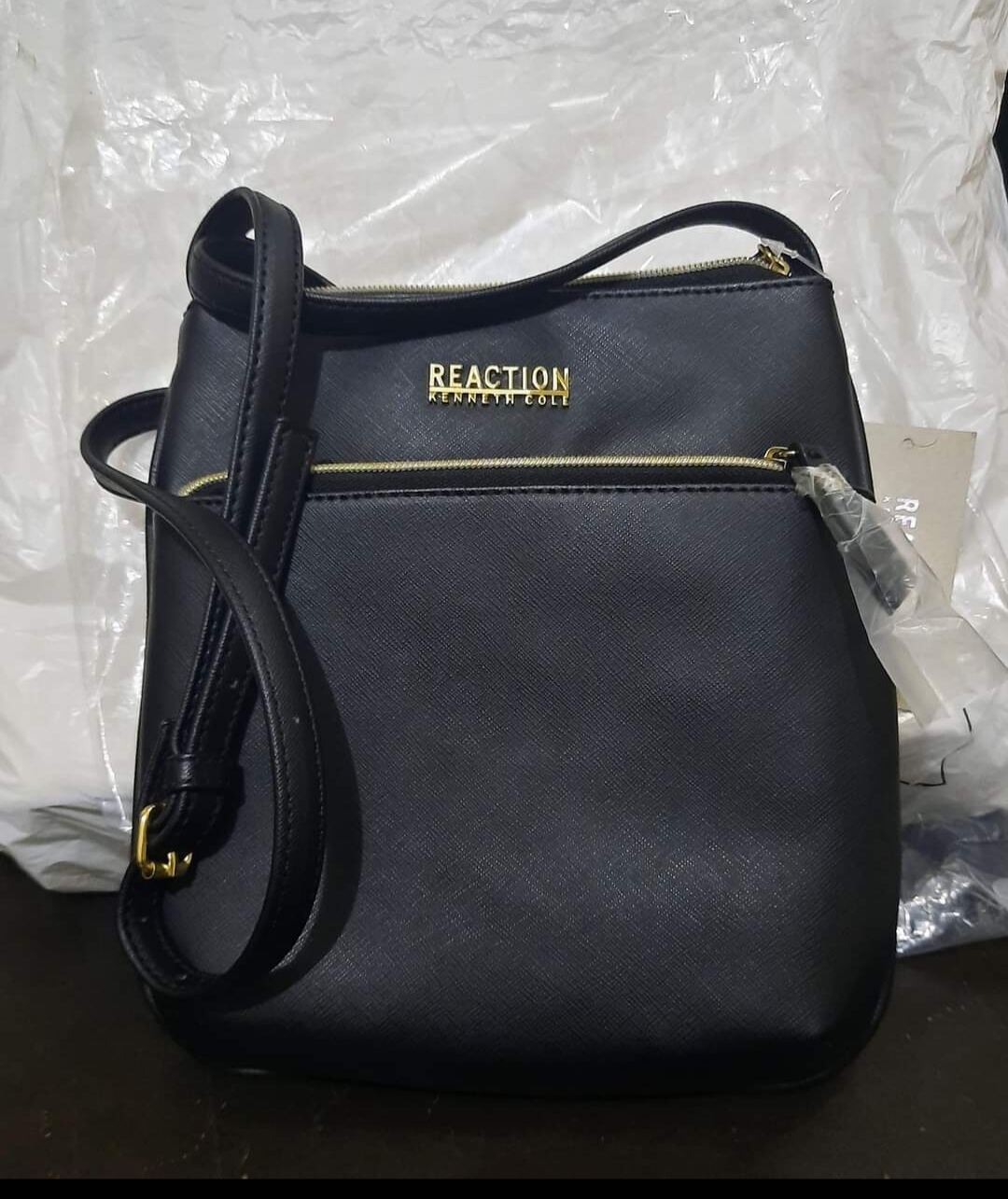 Kenneth cole store reaction sling bag